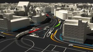 Animation einer Straßenansicht aus der Vogelperspektive mit Straßenkreuzung und abbiegenden Fahrzeugen.
