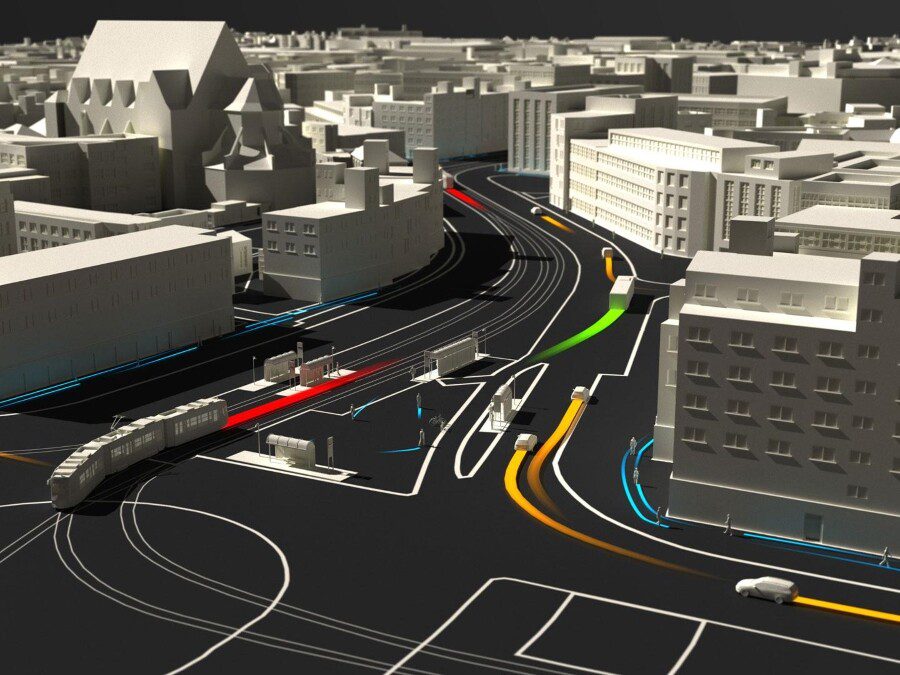 Animation einer Straßenansicht aus der Vogelperspektive mit Straßenkreuzung und abbiegenden Fahrzeugen.